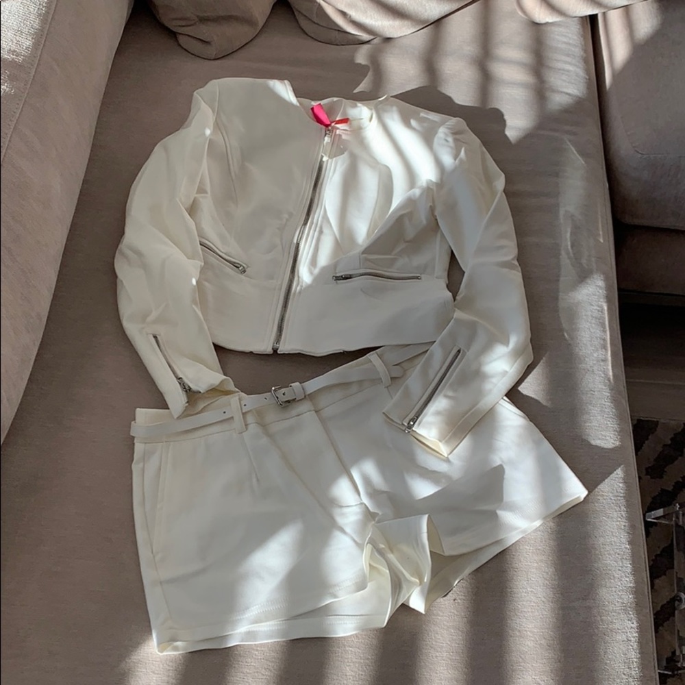 Super cute suit! Small Jacket and medium shorts.